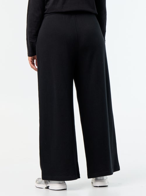 Jogging large uni - Kiabi Jogging large uni - Kiabi