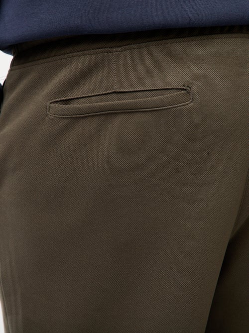 Jogging uni en maille piquée - Kiabi