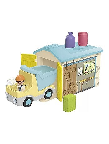 Junior Ouvrier avec camion et garage