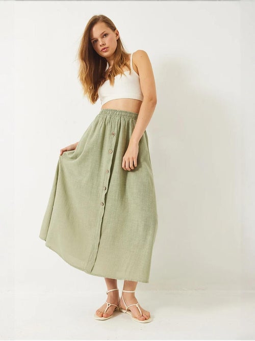 Jupe courte en lin doublée à taille élastique et boutons lucci - Kiabi Jupe courte en lin doublée à taille élastique et boutons lucci - Kiabi