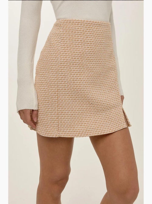 Jupe courte en tweed à taille haute avec fente hiccup - Kiabi Jupe courte en tweed à taille haute avec fente hiccup - Kiabi