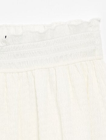 Jupe courte forme patineuse avec short intégré
