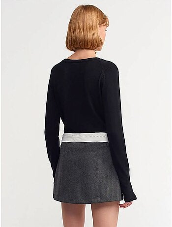 Jupe courte plissée à taille haute avec ceinture dilvin