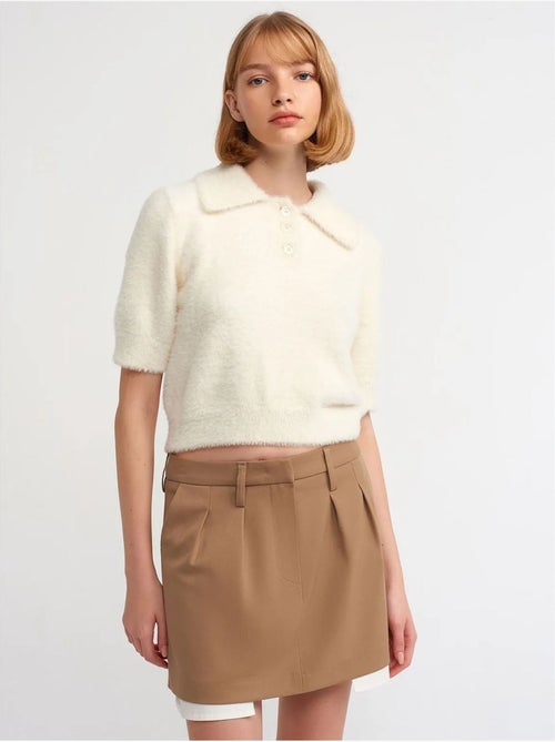 Jupe courte trapèze taille haute avec poche dilvin - Kiabi Jupe courte trapèze taille haute avec poche dilvin - Kiabi