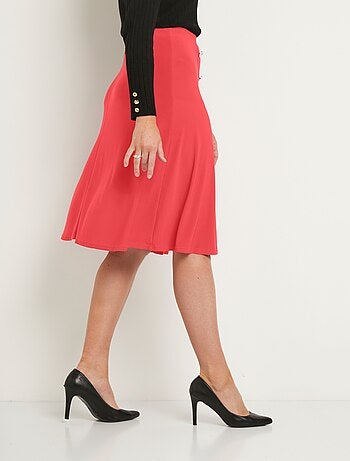 Jupe évasée mi longue maille unie à pont