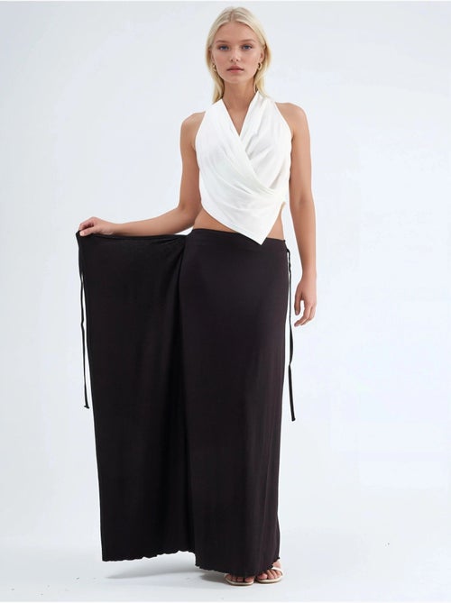 Jupe longue à taille haute avec détail noué busem - Kiabi Jupe longue à taille haute avec détail noué busem - Kiabi