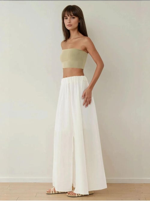 Jupe longue taille haute en A avec fente - Kiabi Jupe longue taille haute en A avec fente - Kiabi