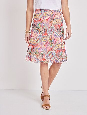 Jupe mi-longue évasée en maille dentelle