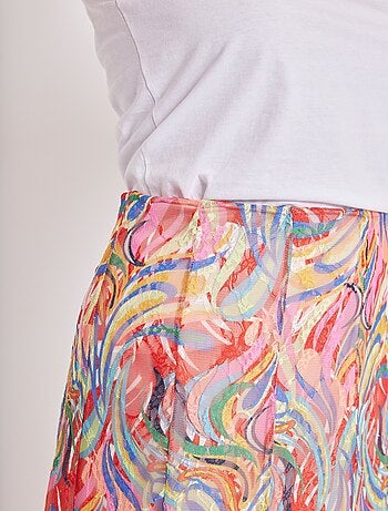 Jupe mi-longue évasée en maille dentelle