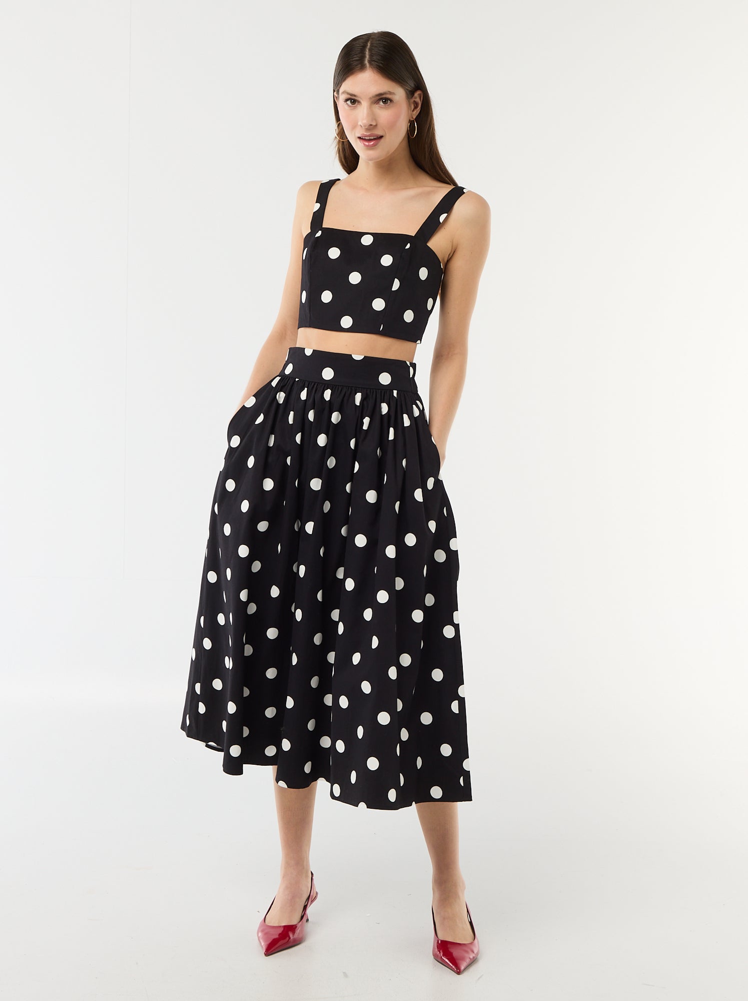 Jupe midi à pinces évasée avec motif à pois