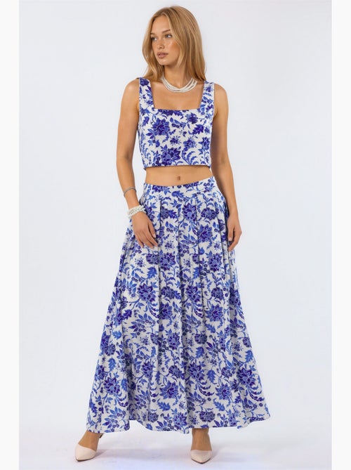 Jupe midi fleurie à taille haute trapèze à plis busem - Kiabi Jupe midi fleurie à taille haute trapèze à plis busem - Kiabi