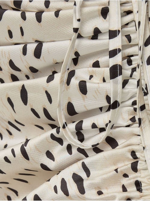 Jupe midi moulante en satin imprimé avec fente - Kiabi