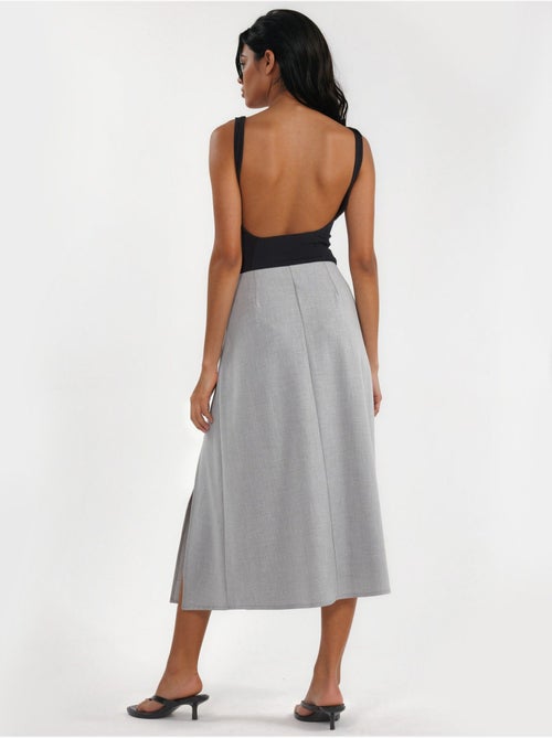 Jupe midi trapèze taille haute avec ceinture - Kiabi Jupe midi trapèze taille haute avec ceinture - Kiabi