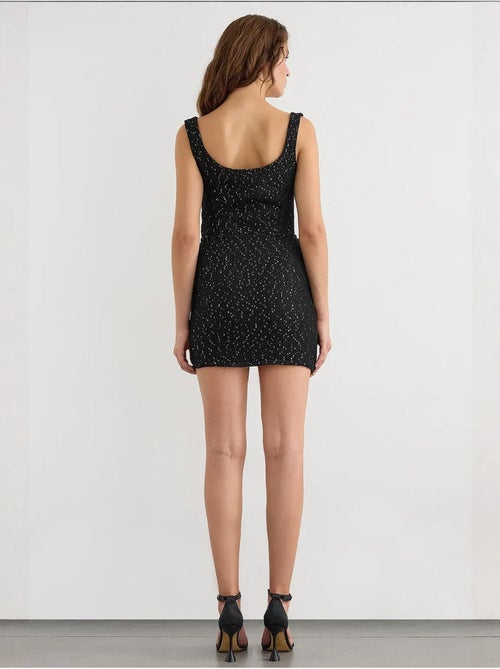 Jupe portefeuille tricotée à sequins avec ourlet sans couture et ceinture - Kiabi Jupe portefeuille tricotée à sequins avec ourlet sans couture et ceinture - Kiabi