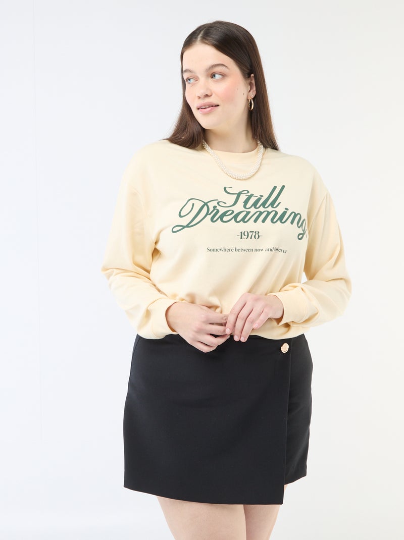 Jupe short avec pan croisé avec bouton fantaisie Noir - Kiabi