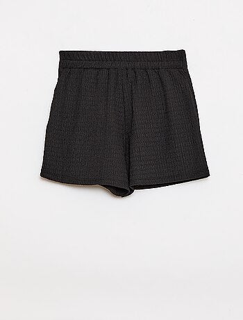 Jupe-short courte en maille légère unie