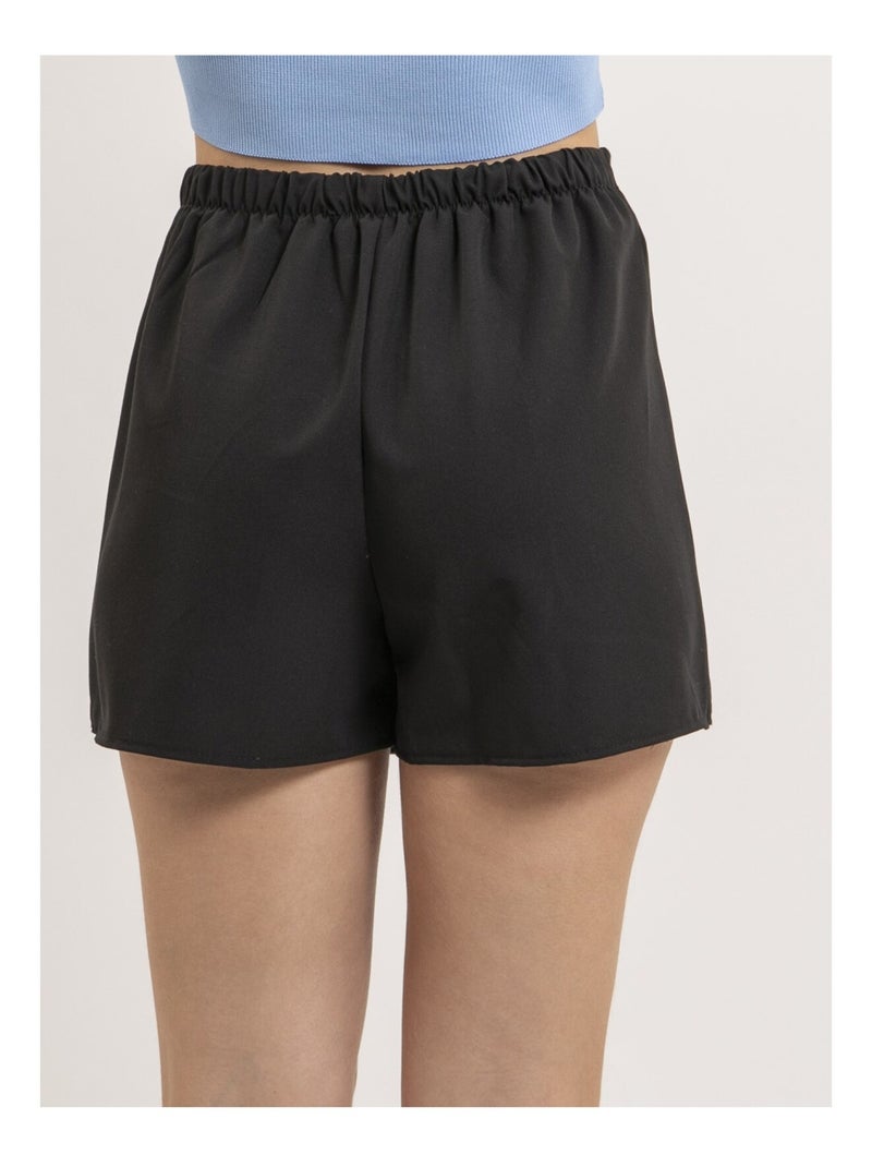 Jupe short courte portefeuille XAKO Noir - Kiabi
