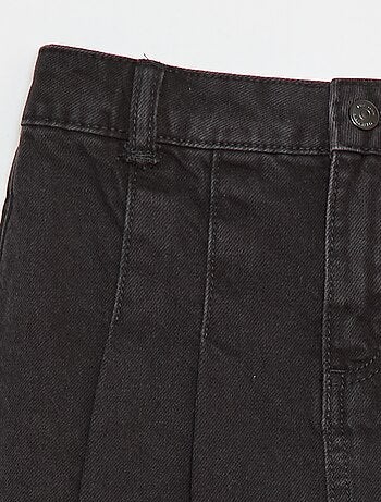 Jupe short en denim plissé
