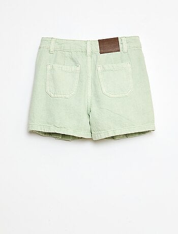 Jupe short en denim plissé
