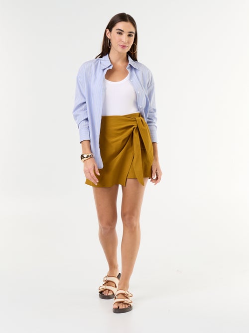Jupe short léger avec ceinture à nouer - Kiabi Jupe short léger avec ceinture à nouer - Kiabi