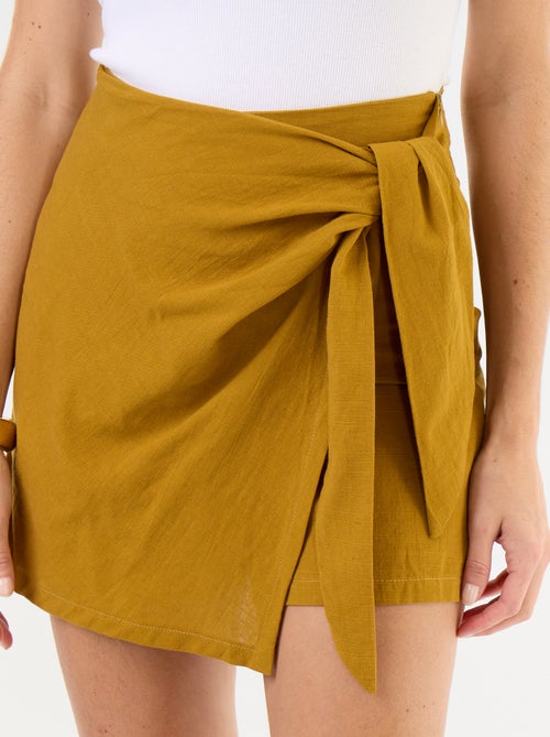 Jupe short léger avec ceinture à nouer - Kiabi Jupe short léger avec ceinture à nouer - Kiabi