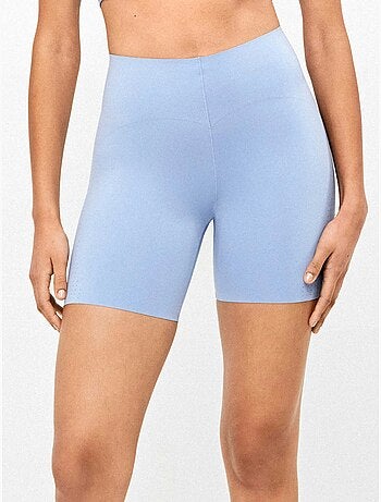 Legging biker réalisé en tissu sculptant qui définit et stylise