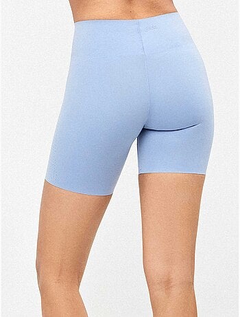 Legging biker réalisé en tissu sculptant qui définit et stylise