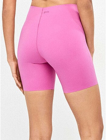 Legging biker réalisé en tissu sculptant qui définit et stylise