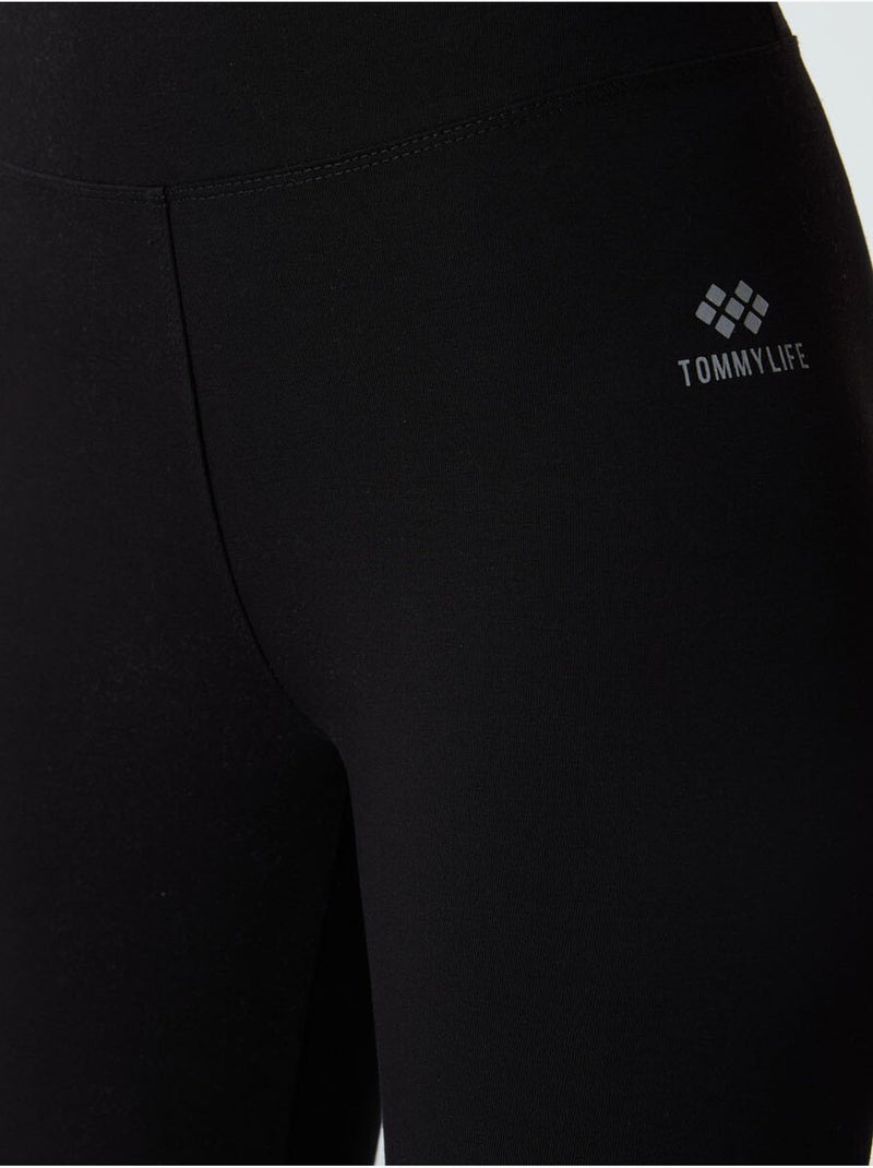 Legging capri taille haute tommy Noir - Kiabi
