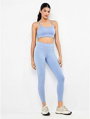 Legging long confectionné dans un tissu modelant qui définit et stylise