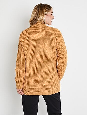 Long gilet chaud perlé col V torsadé pressionné