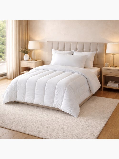 Lot couette chaude premium anti-acariens + 1 oreiller respirant - Kiabi Lot couette chaude premium anti-acariens + 1 oreiller respirant - Kiabi