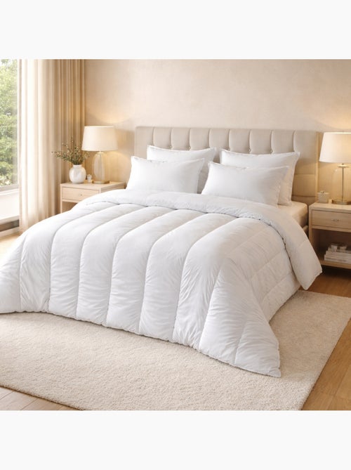 Lot couette chaude premium anti-acariens + 2 oreillers respirants - Kiabi Lot couette chaude premium anti-acariens + 2 oreillers respirants - Kiabi
