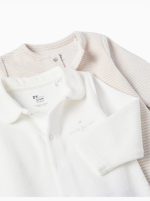 Lot de 2 pyjamas unis/à rayures en velours - Kiabi Lot de 2 pyjamas unis/à rayures en velours - Kiabi