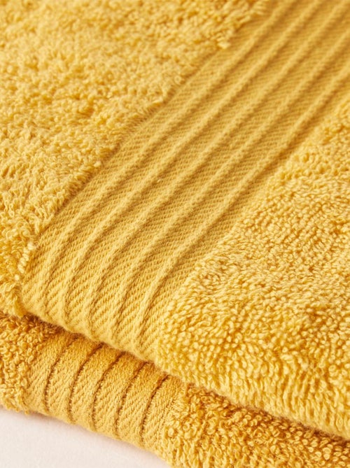 Lot de 2 serviettes de toilette coton uni ESSENTIAL - Kiabi Lot de 2 serviettes de toilette coton uni ESSENTIAL - Kiabi