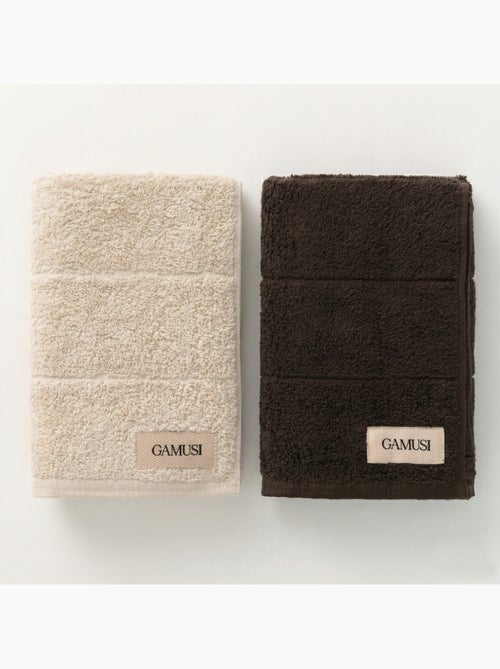 Lot de serviettes bain et toilette 100 % coton, 600 g/m², avec boucle - Gamusi - Kiabi Lot de serviettes bain et toilette 100 % coton, 600 g/m², avec boucle - Gamusi - Kiabi