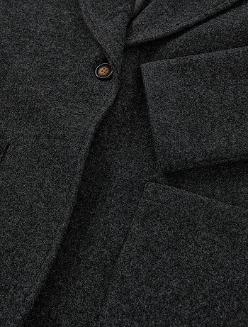 Manteau à effet laine avec poches à l'avant