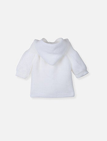 Manteau en tricot bord-côte pour bébé