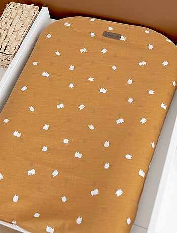 Matelas à langer avec housse motif enfantin