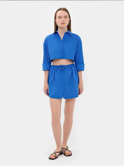 Mini-jupe boutonnée taille haute avec cordon de serrage - Kiabi