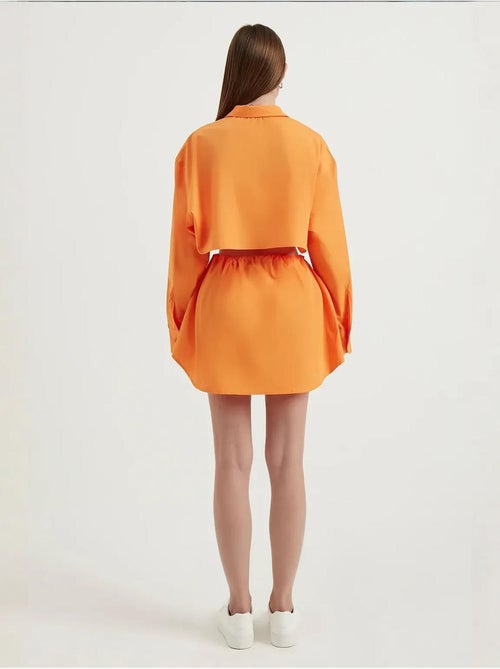 Mini-jupe boutonnée taille haute avec cordon de serrage - Kiabi
