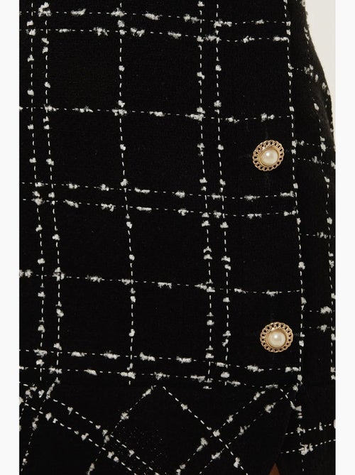 Mini-jupe en tweed à volants avec détails boutonnés hiccup - Kiabi Mini-jupe en tweed à volants avec détails boutonnés hiccup - Kiabi