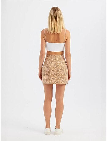 Mini-jupe fleurie taille haute fendue sur le côté