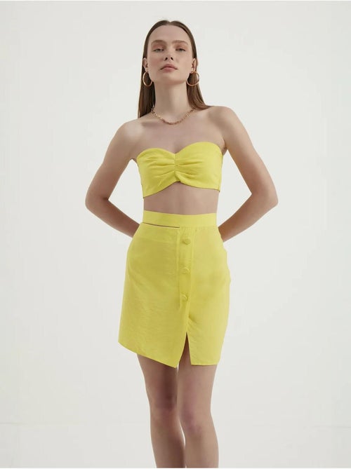 Mini-jupe taille haute avec boutons latéraux - Kiabi