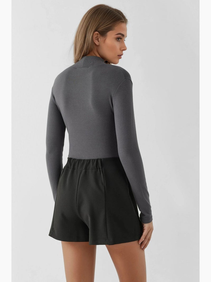 Mini-jupe taille haute avec double fente hiccup Noir - Kiabi