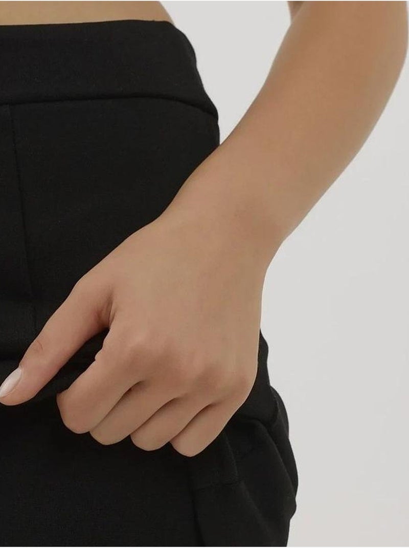 Mini-jupe texturée avec taille élastique Noir - Kiabi