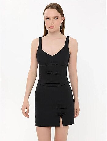 Mini-jupe tissée taille haute avec détail nœud
