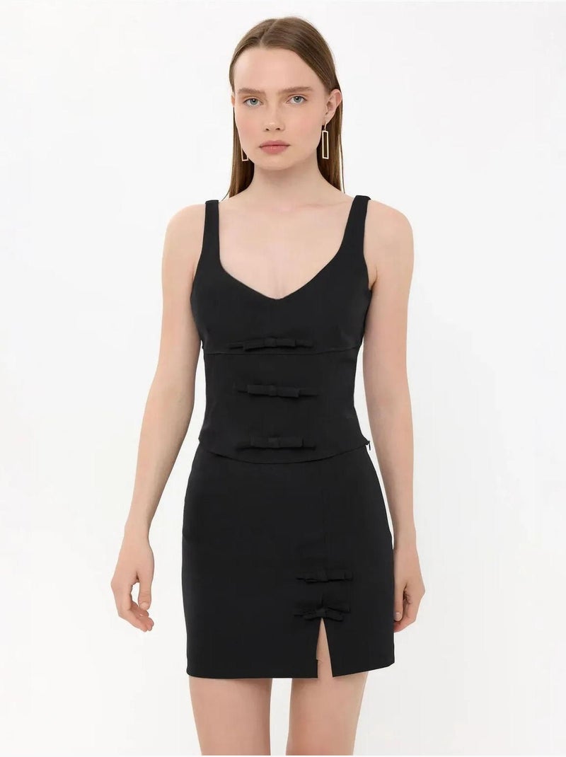 Mini-jupe tissée taille haute avec détail nœud Noir - Kiabi