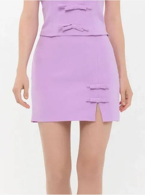 Mini-jupe tissée taille haute avec détail nœud - Kiabi Mini-jupe tissée taille haute avec détail nœud - Kiabi