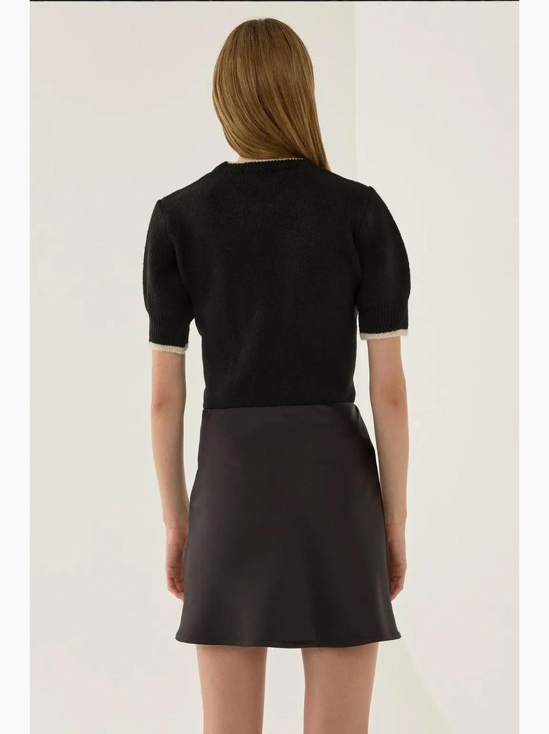 Mini-jupe unie en satin hiccup Noir - Kiabi
